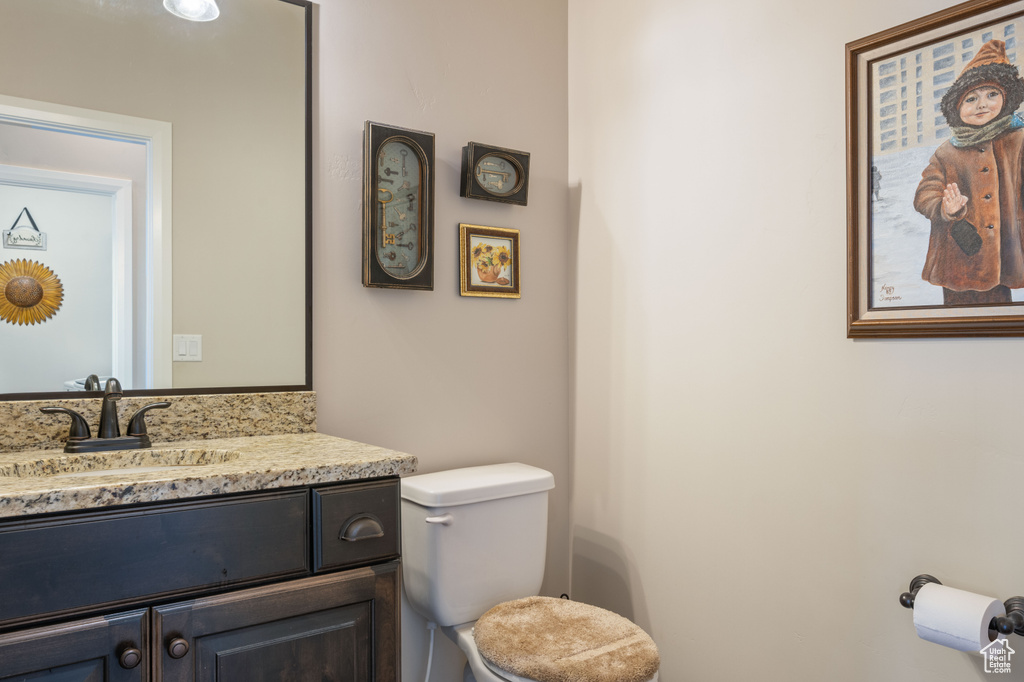 Bathroom with vanity and toilet