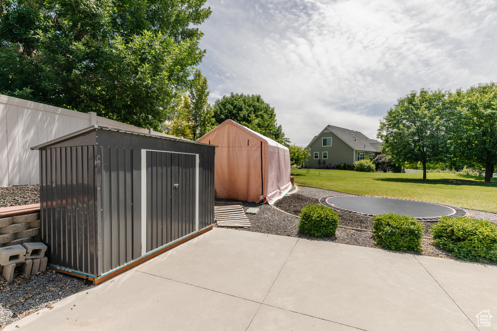 View of patio / terrace with a storage shed