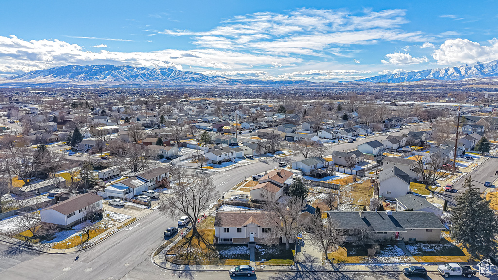 Birds eye view of property with a mountain view