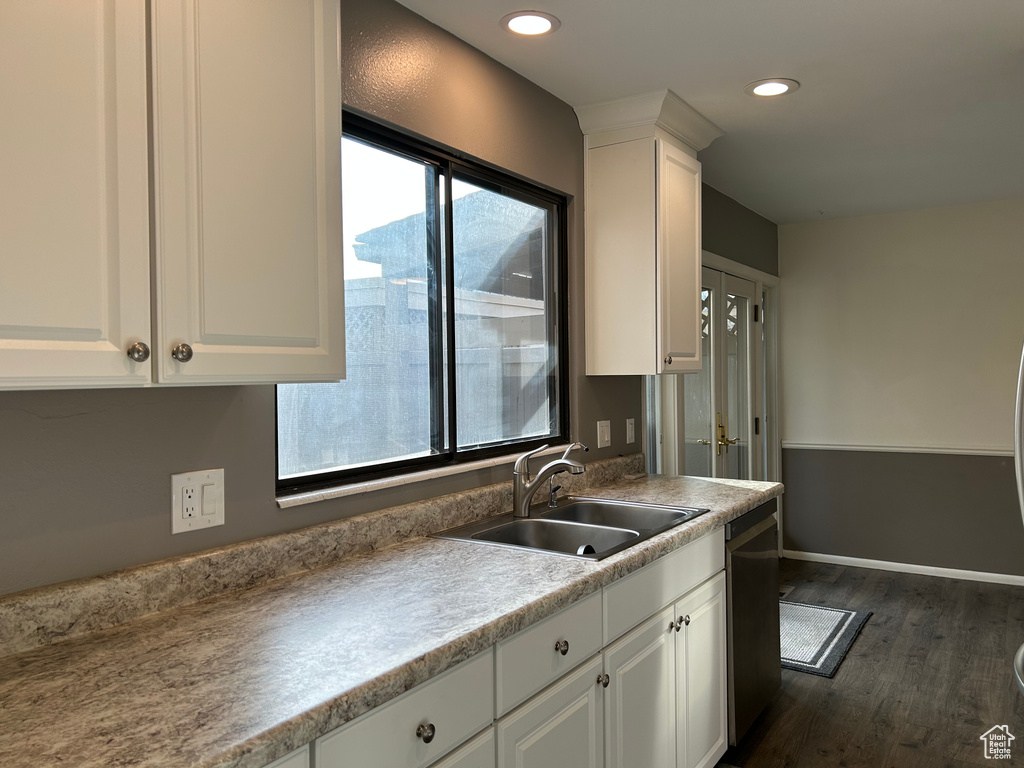 Kitchen with sink and white cabinets