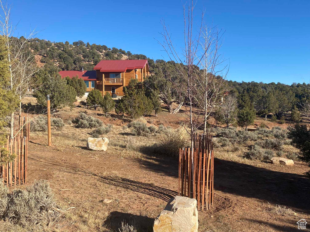 Exterior space featuring a view of trees