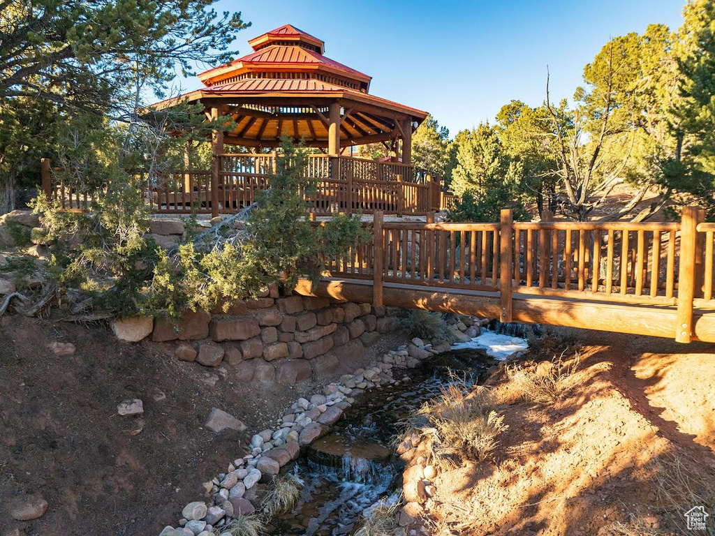 Exterior space featuring a deck and a gazebo