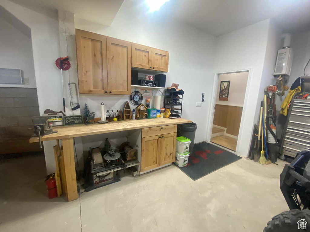 Kitchen with concrete flooring