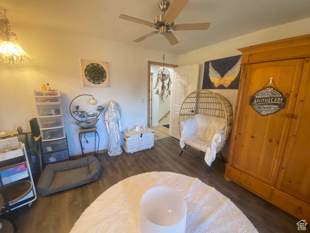 Playroom featuring ceiling fan and wood finished floors