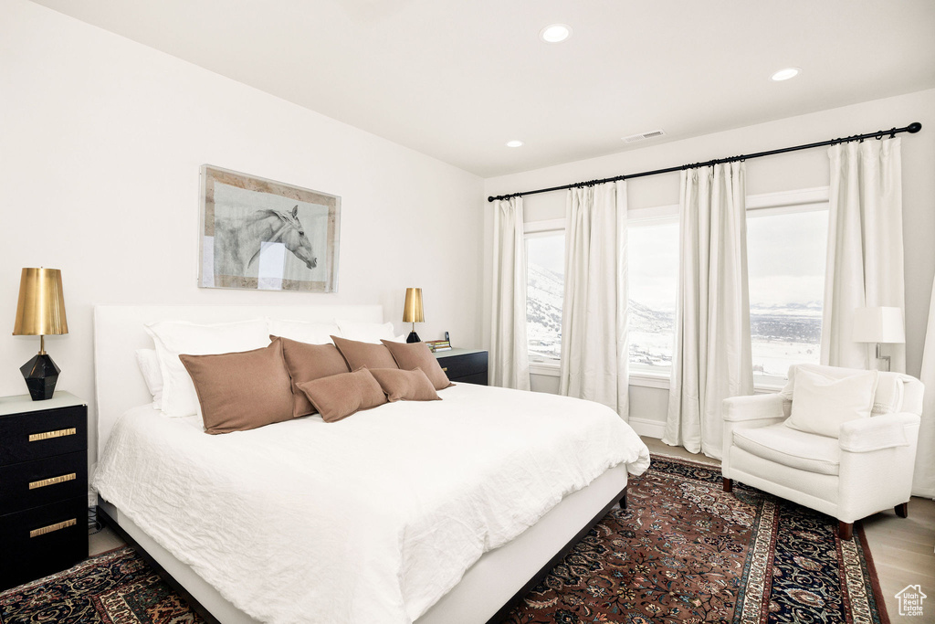 Bedroom featuring hardwood / wood-style flooring
