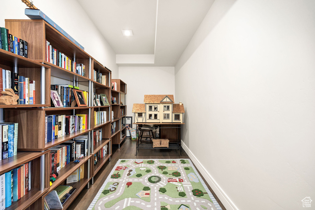 Home office featuring dark hardwood / wood-style floors
