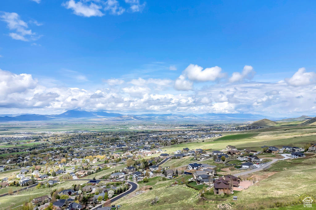 Birds eye view of property featuring a residential view and a mountain view