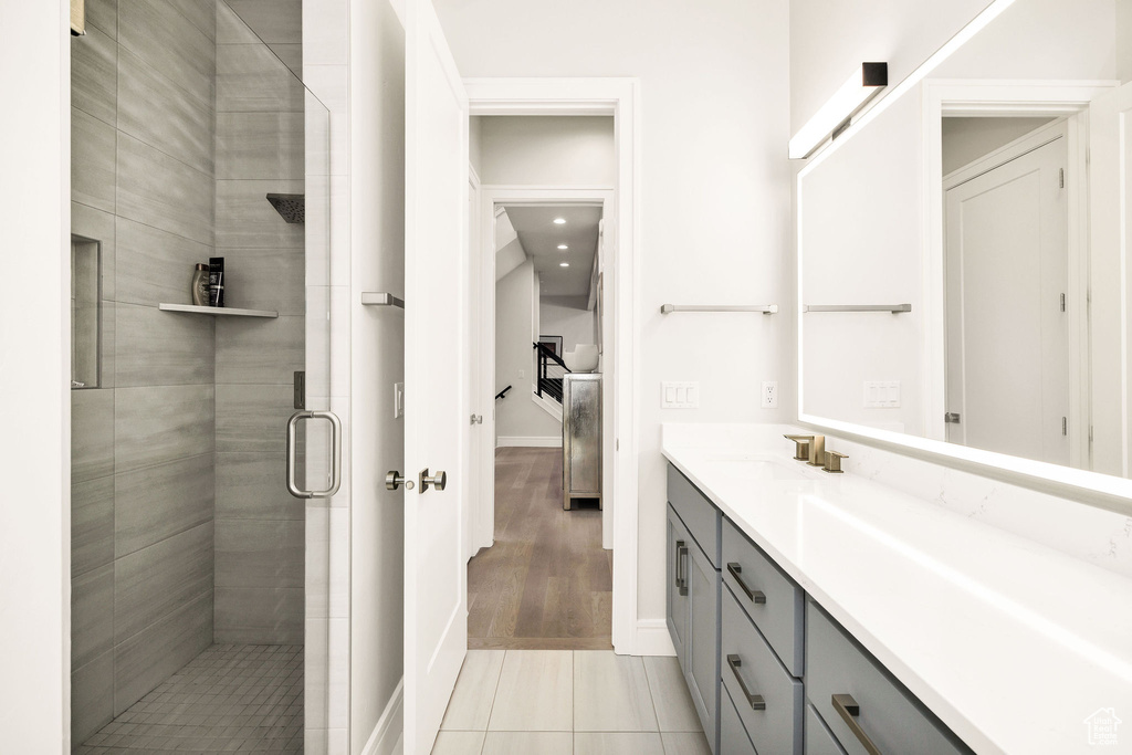 Bathroom featuring vanity and walk in shower