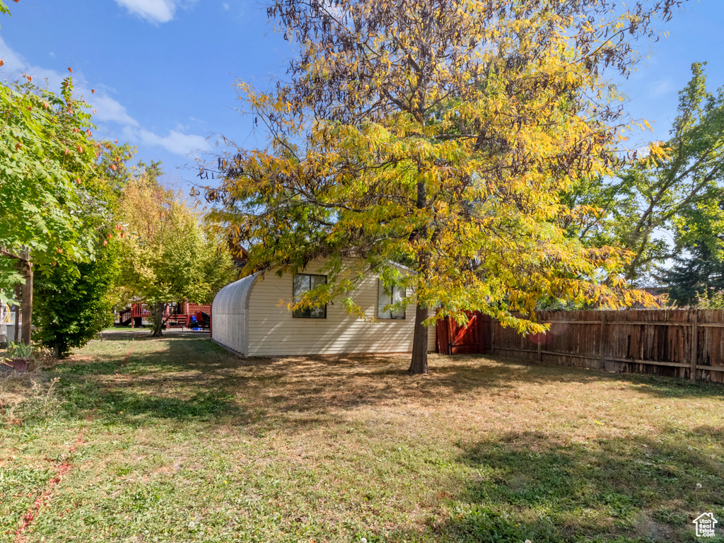 View of yard with fence