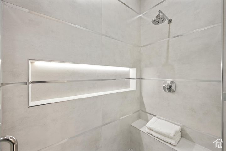 Bathroom with a tile shower