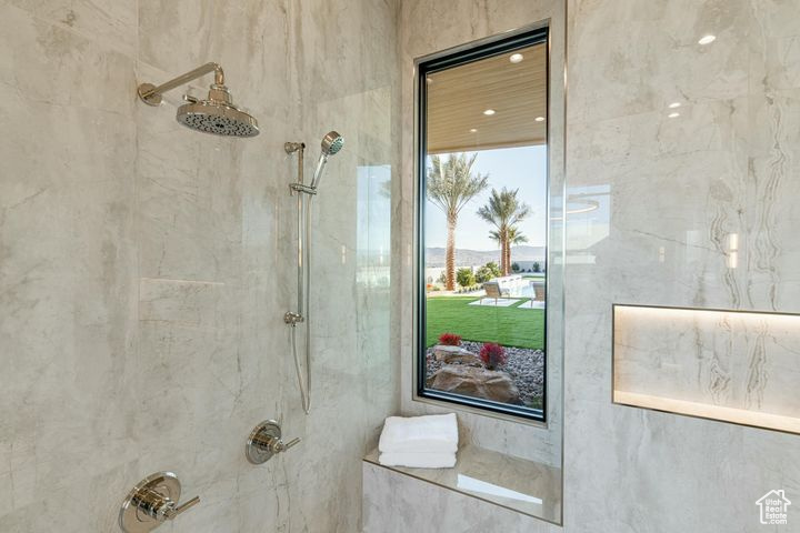 Bathroom with tiled shower