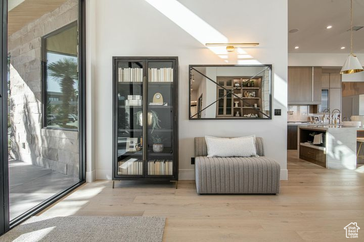 Sitting room featuring light hardwood / wood-style floors
