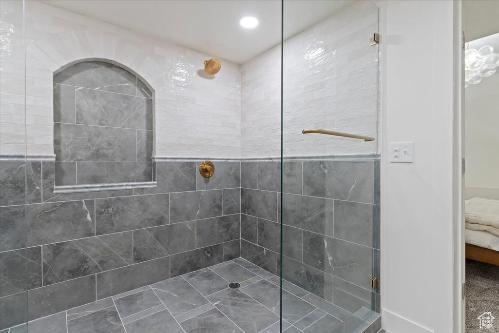 Bathroom with tiled shower