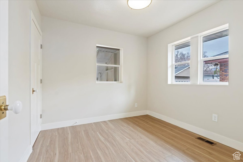 Unfurnished room featuring light hardwood / wood-style floors