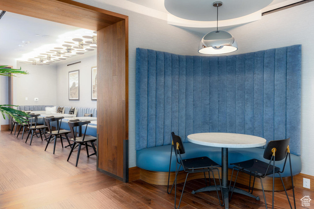 Dining room with wood-type flooring