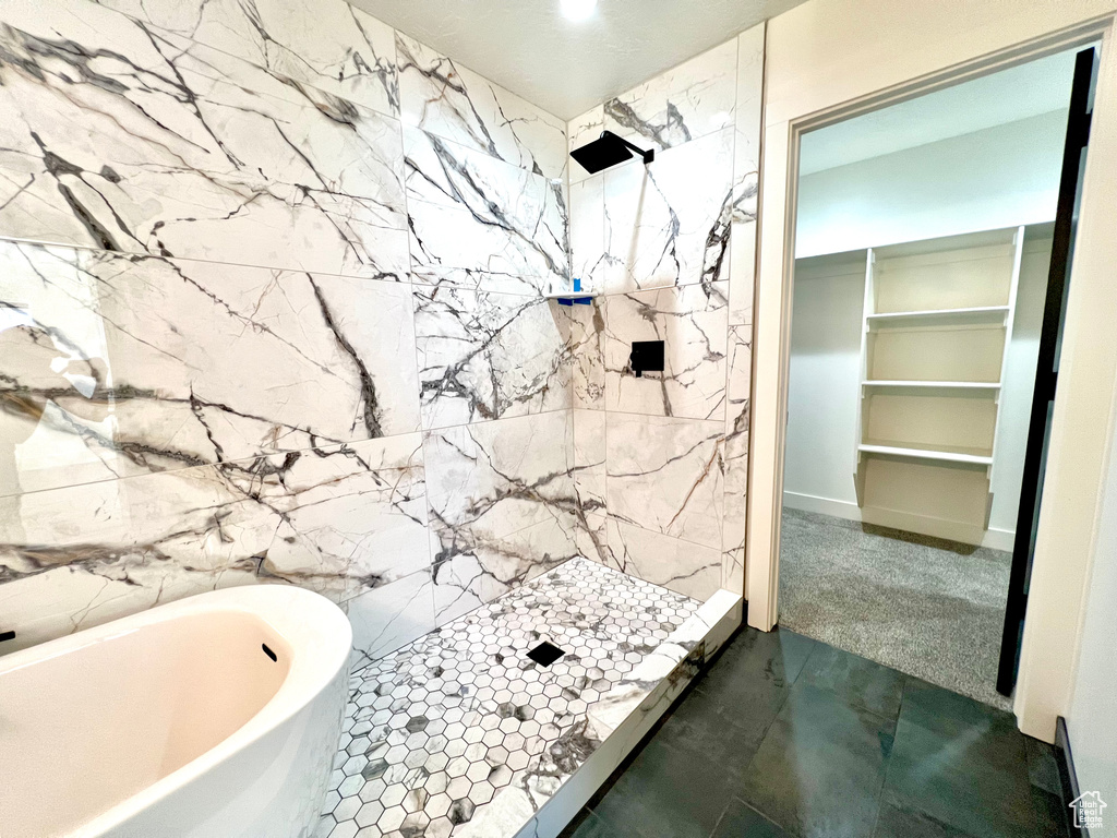 Bathroom with shower with separate bathtub