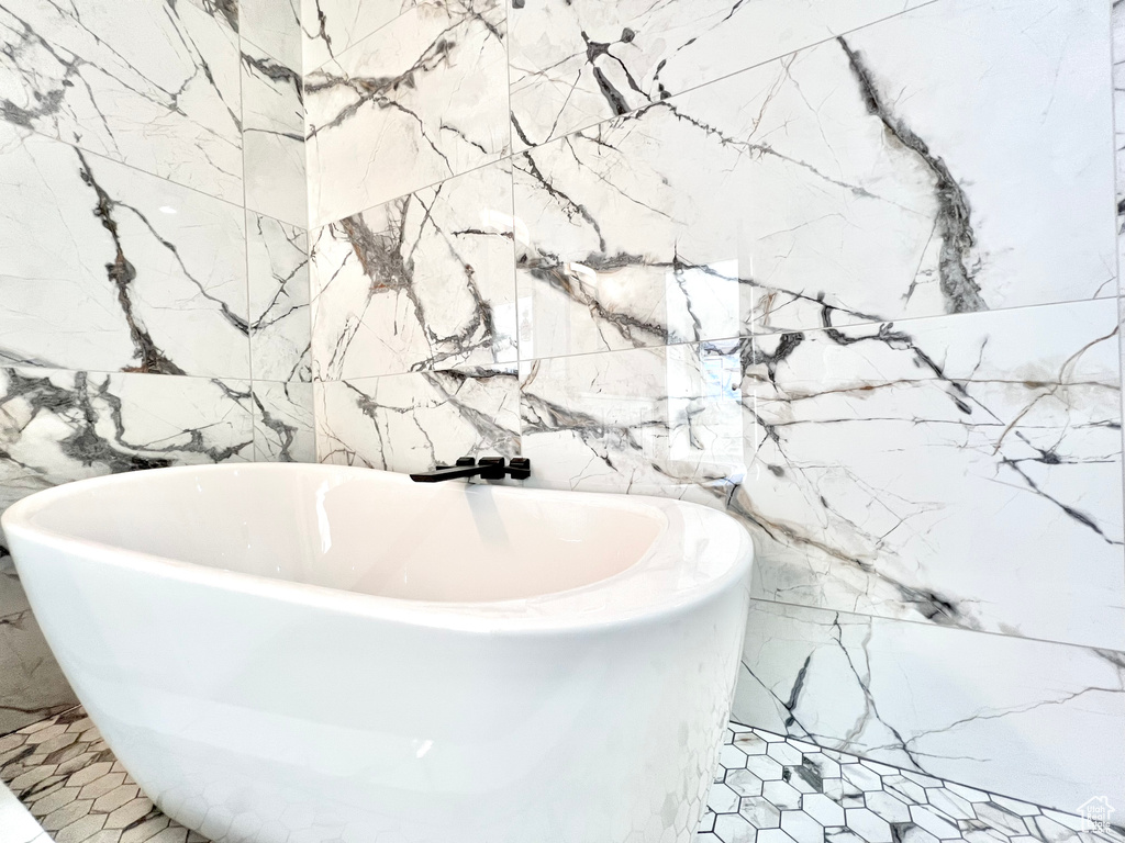 Bathroom featuring a tub