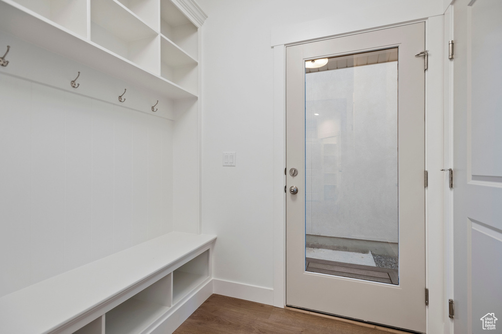 Mudroom with dark wood-style floors