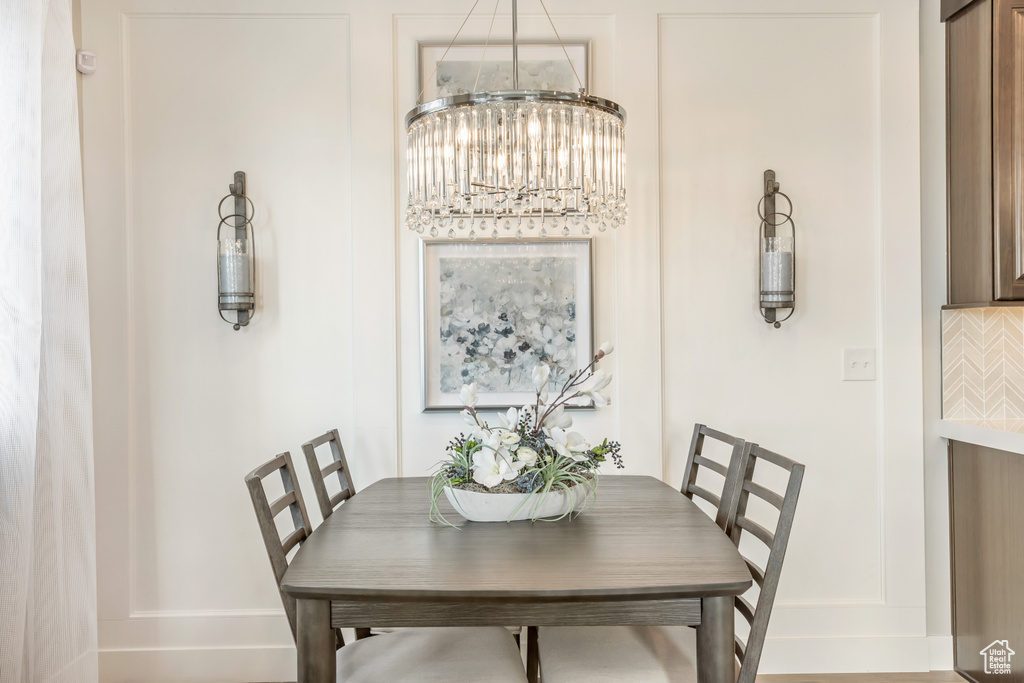 Dining area featuring a notable chandelier