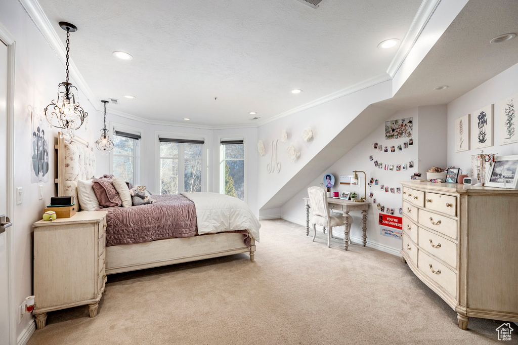 Bedroom featuring light carpet, crown molding, baseboards, and recessed lighting