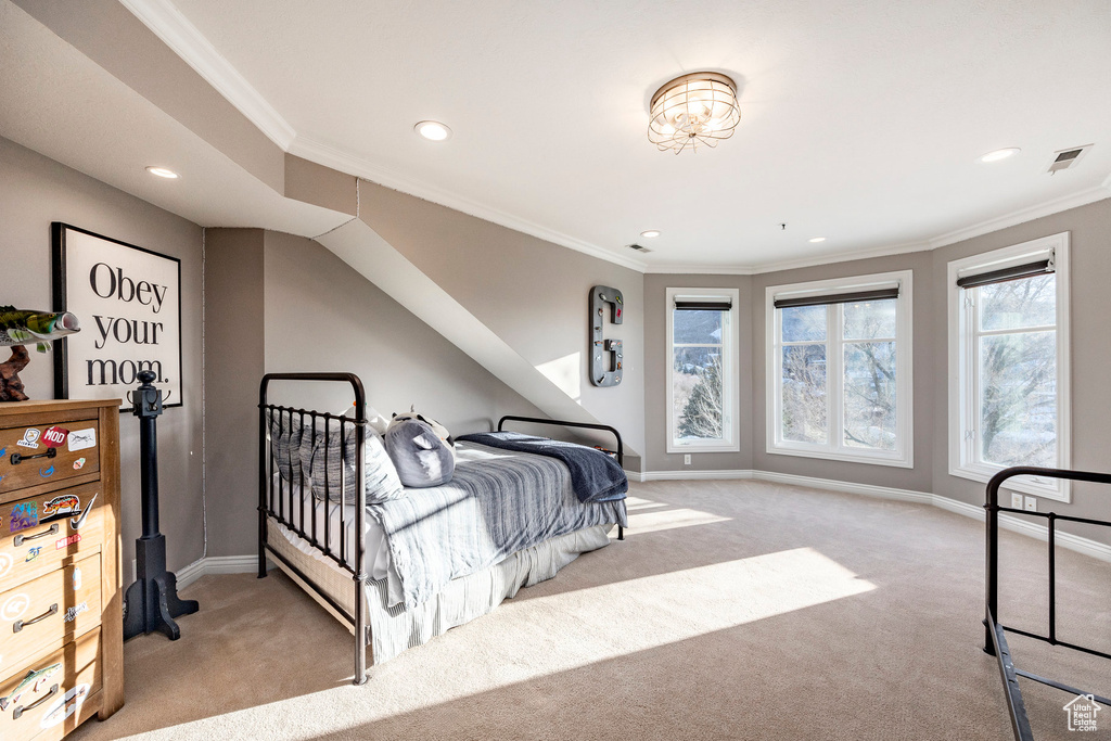 Bedroom featuring carpet floors, recessed lighting, baseboards, and ornamental molding