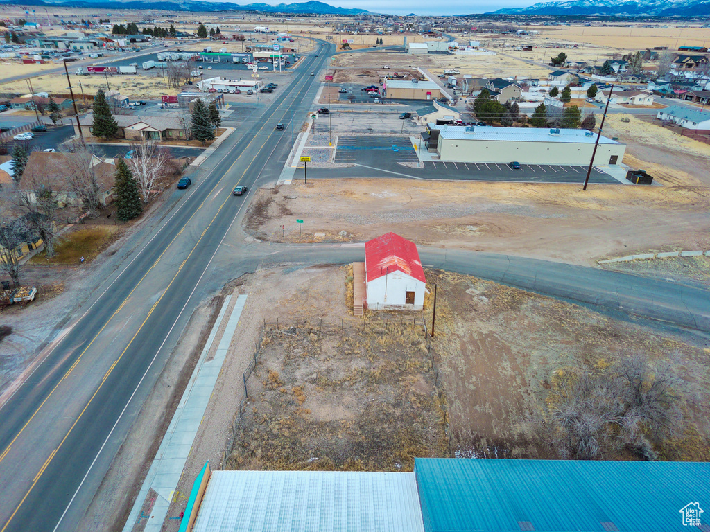 Birds eye view of property featuring a mountain view