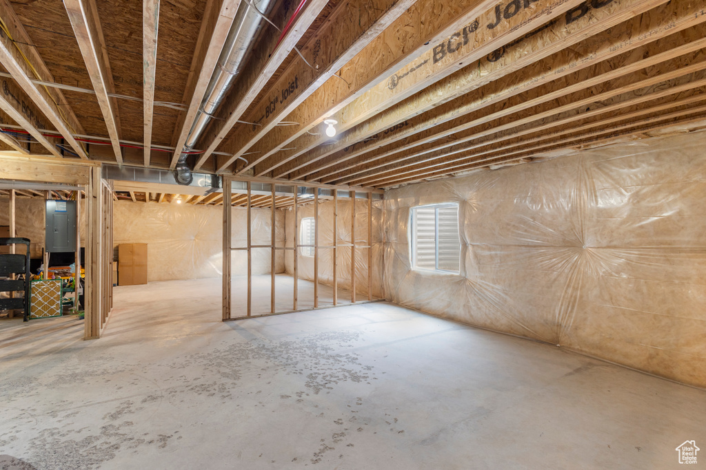 Basement featuring electric panel