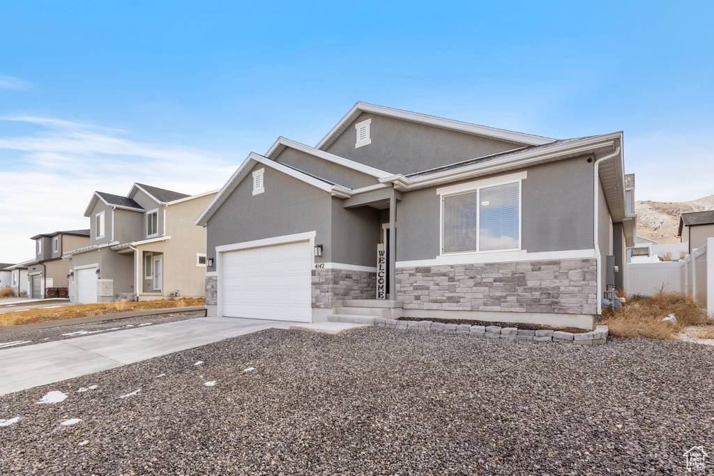 View of front of house with a garage