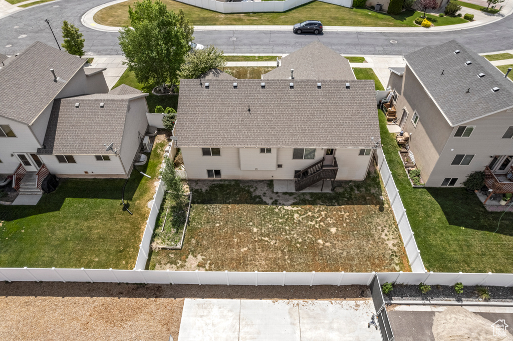 Birds eye view of property with a residential view