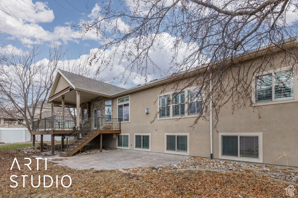 Rear view of house with a patio area