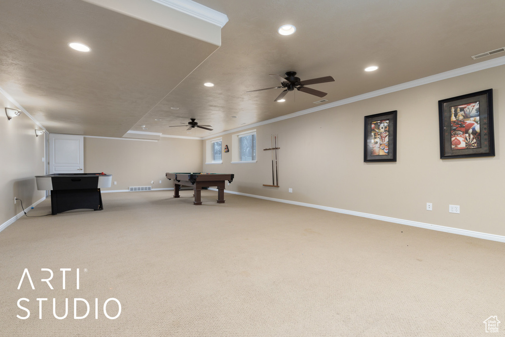 Game room featuring carpet, crown molding, billiards, and ceiling fan