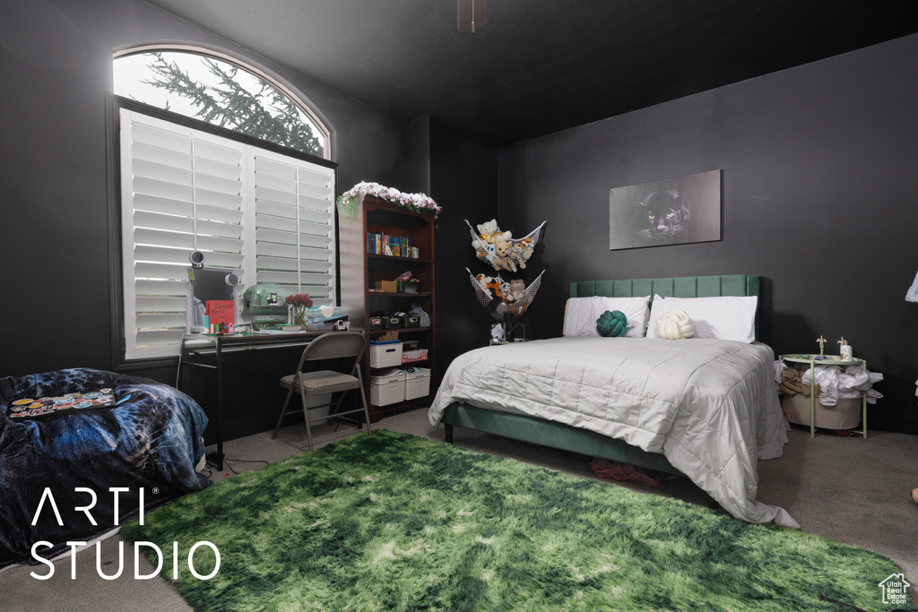 Bedroom featuring carpet flooring