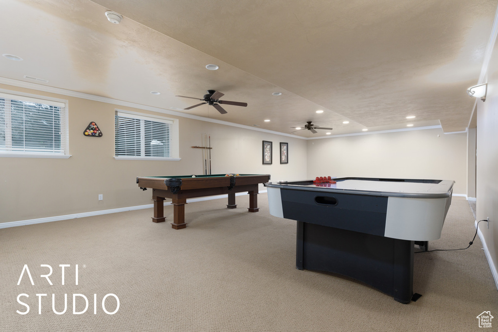 Rec room featuring ornamental molding, billiards, and light carpet