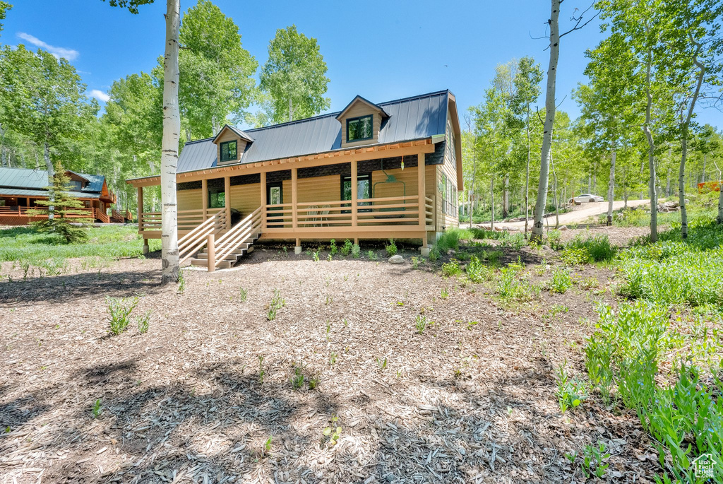 View of front of property featuring metal roof
