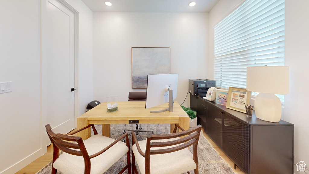 Office area featuring recessed lighting and light wood-style floors