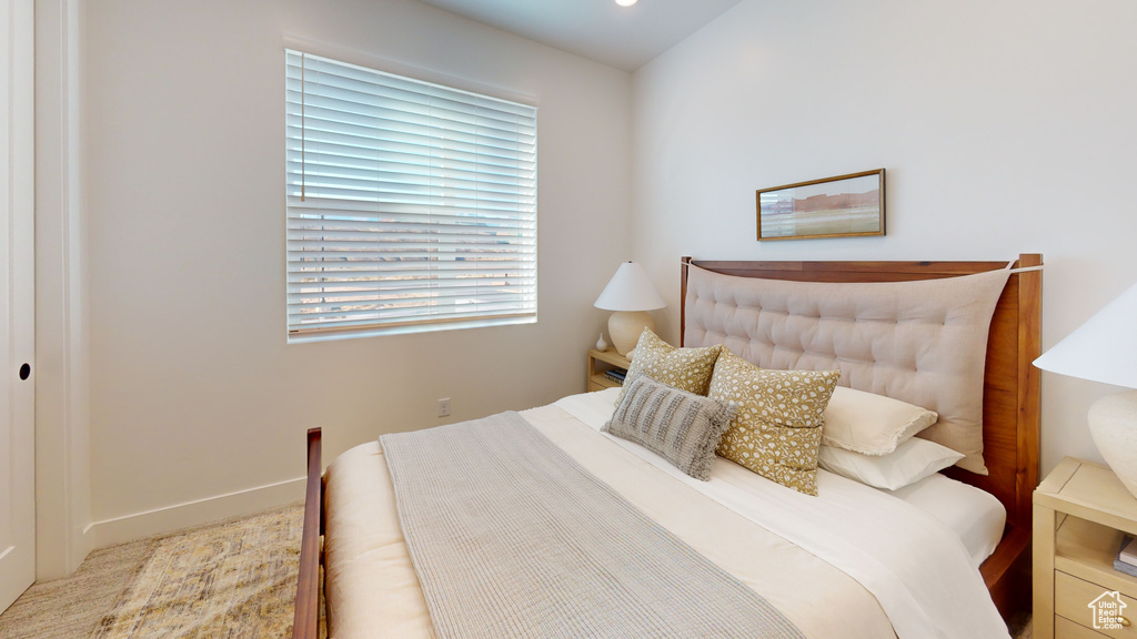 Bedroom featuring baseboards