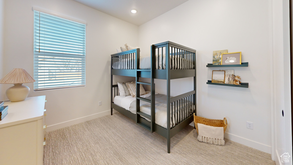 Bedroom featuring recessed lighting, baseboards, and carpet flooring