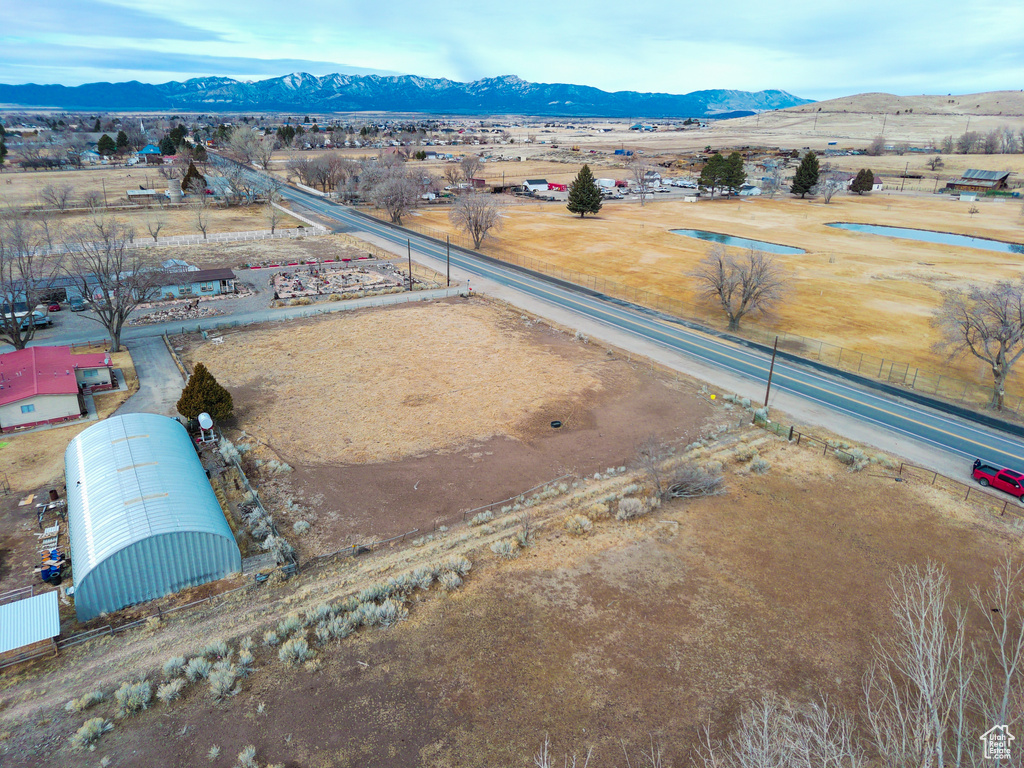 Drone / aerial view featuring a mountain view and a rural view