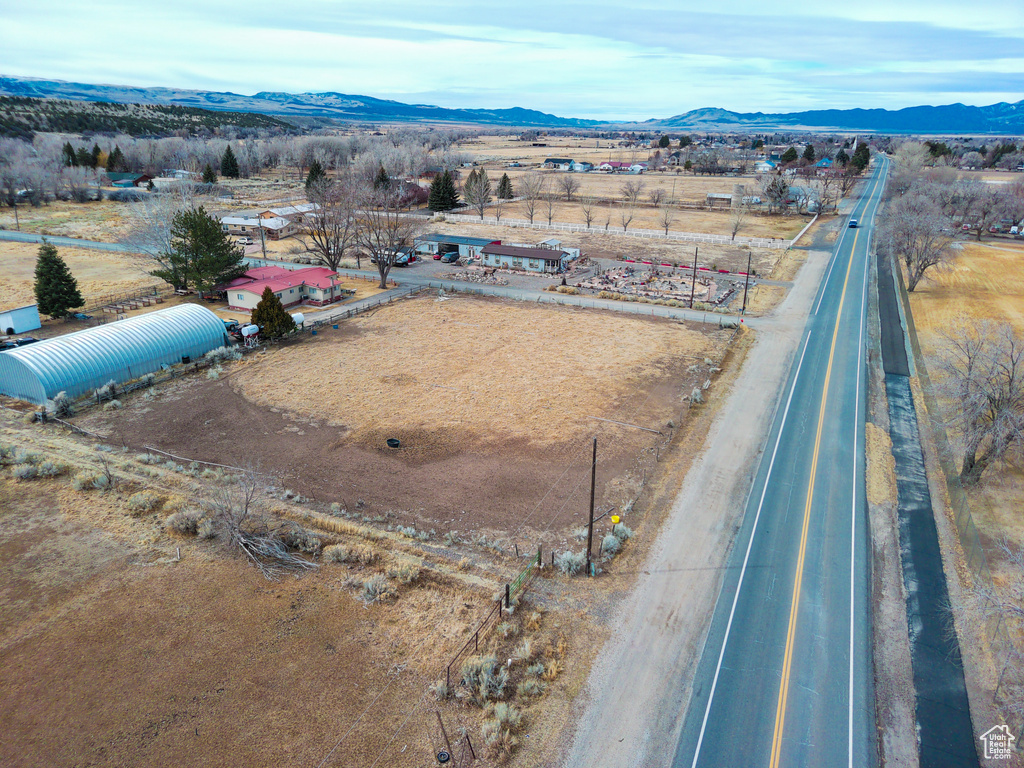 Drone / aerial view featuring a rural view and a mountain view