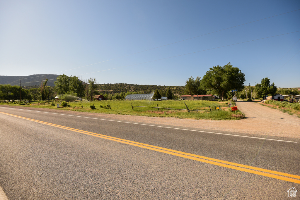 View of asphalt road featuring a mountain view
