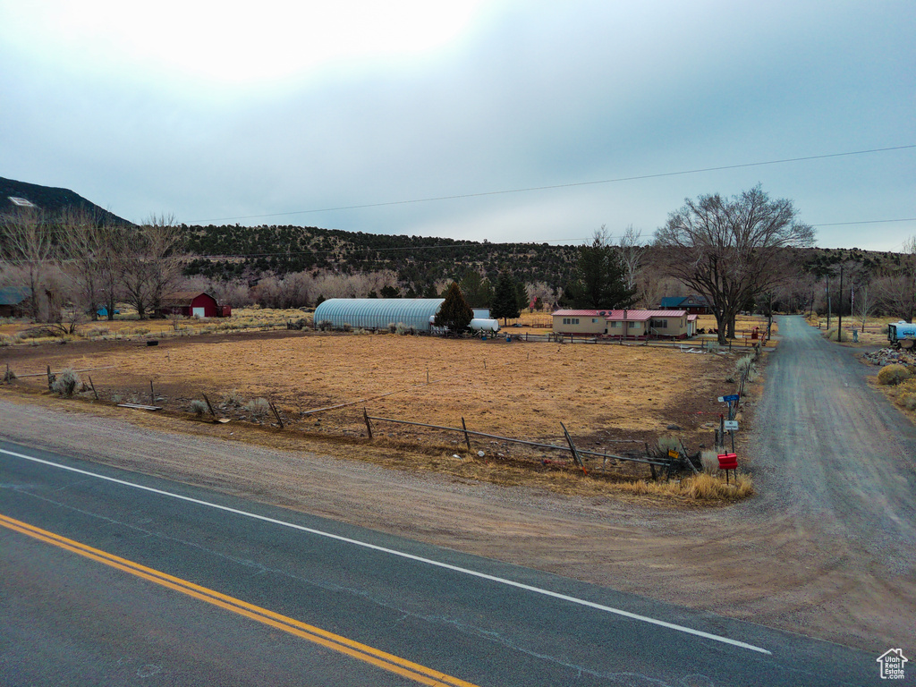 View of street featuring a mountain view and a rural view