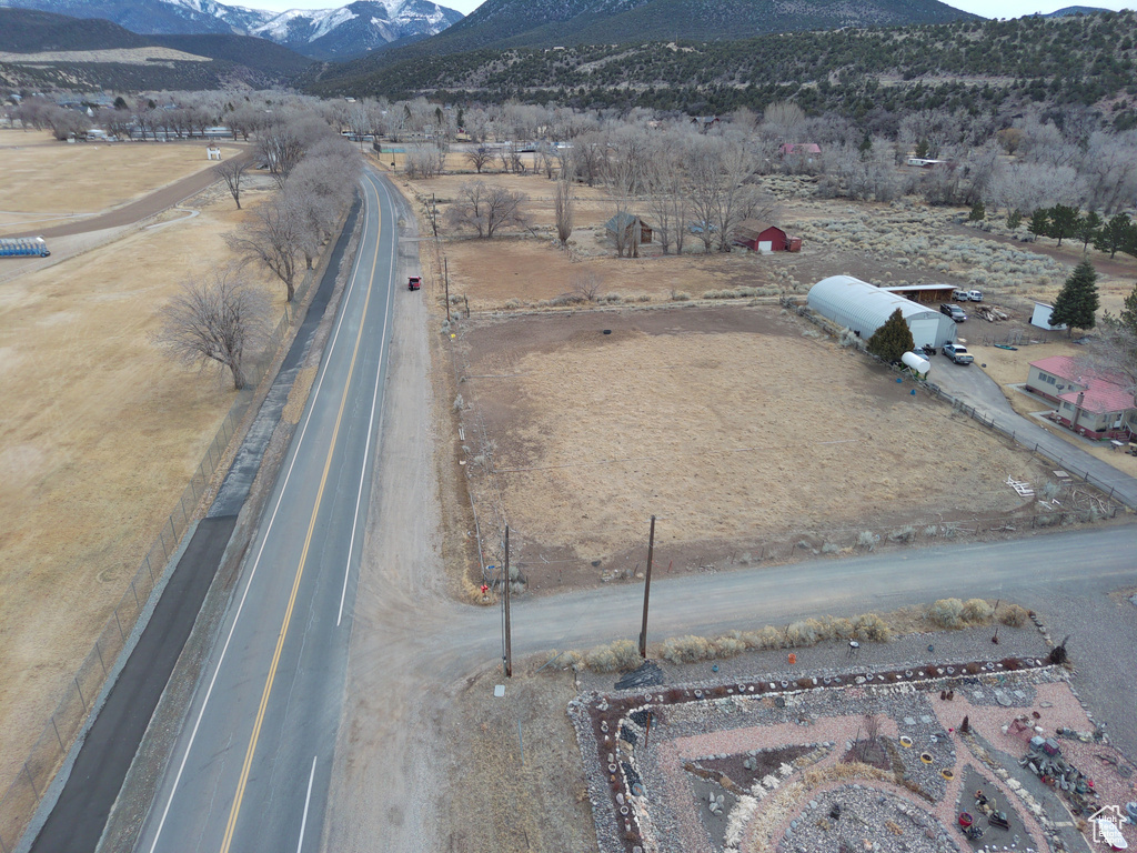 Drone / aerial view featuring a rural view and a mountain view