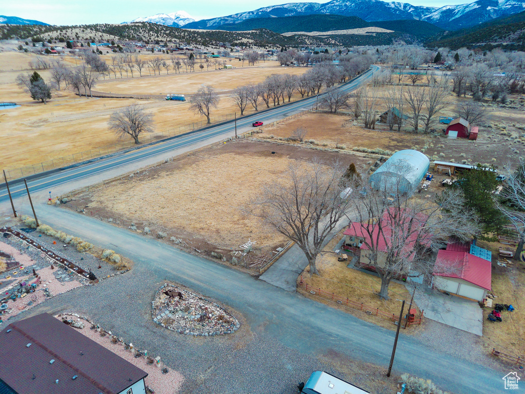 Birds eye view of property featuring a mountain view