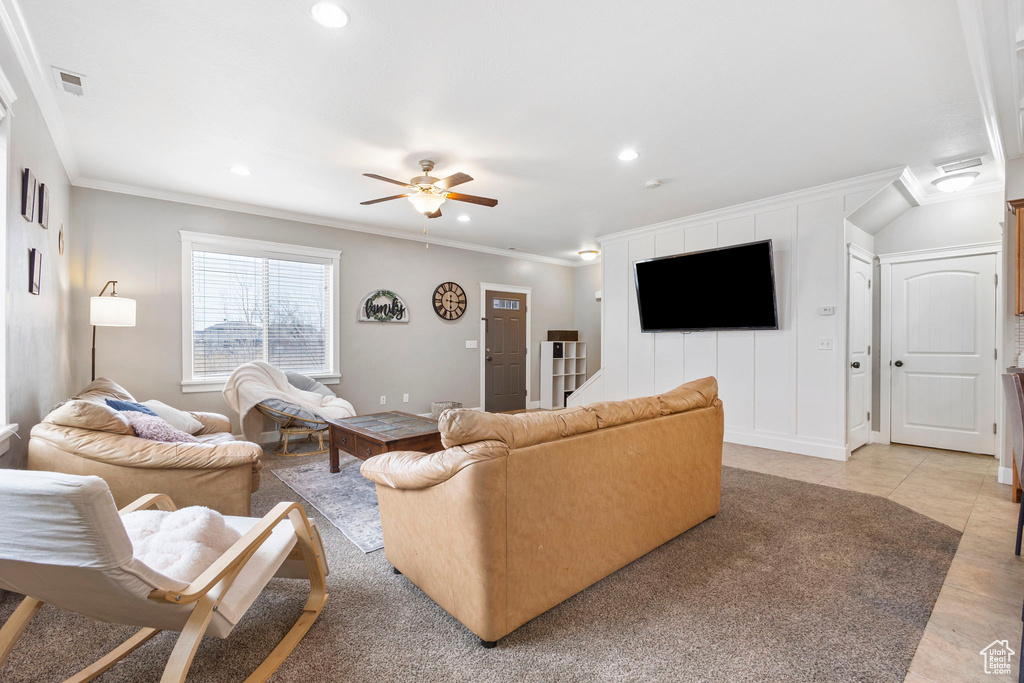 Living room with ceiling fan, recessed lighting, visible vents, and crown molding