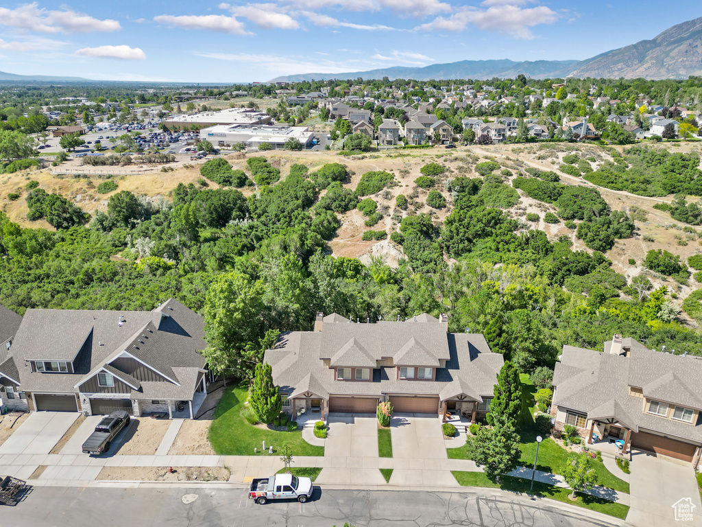 Aerial view featuring a mountain view and a residential view