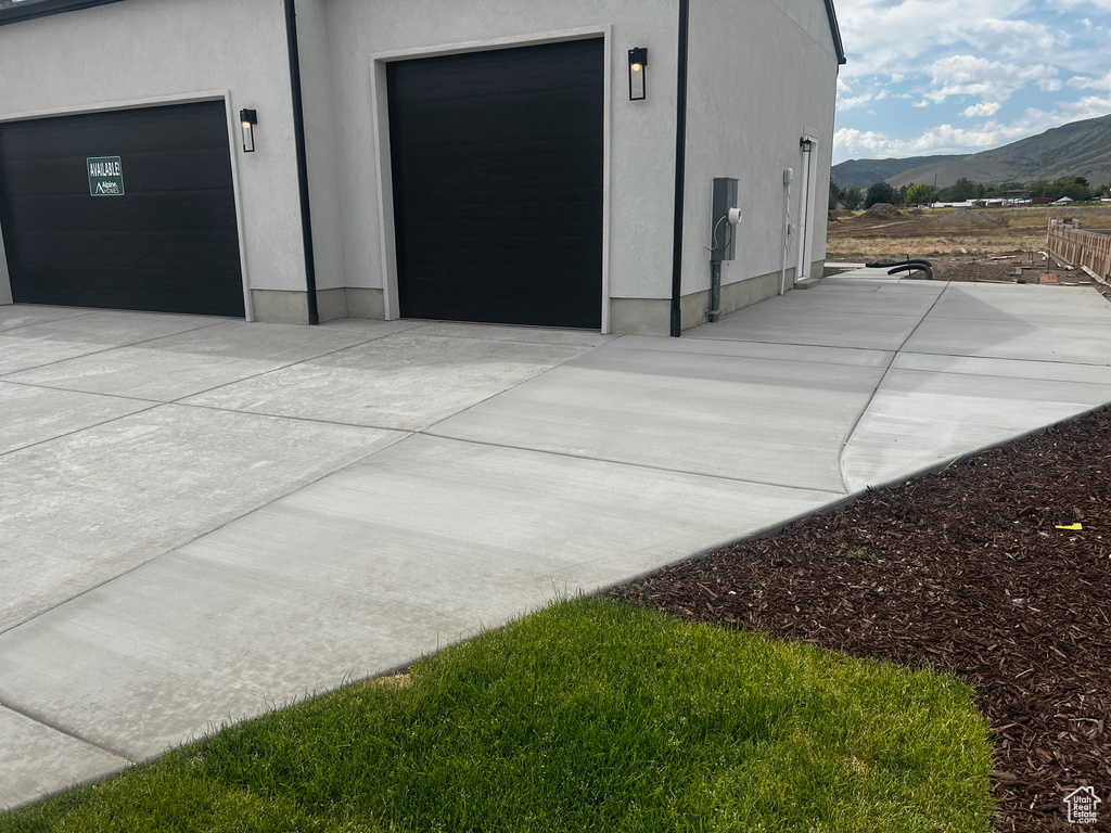 Garage featuring a mountain view