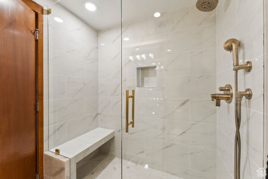 Full bathroom with a stall shower