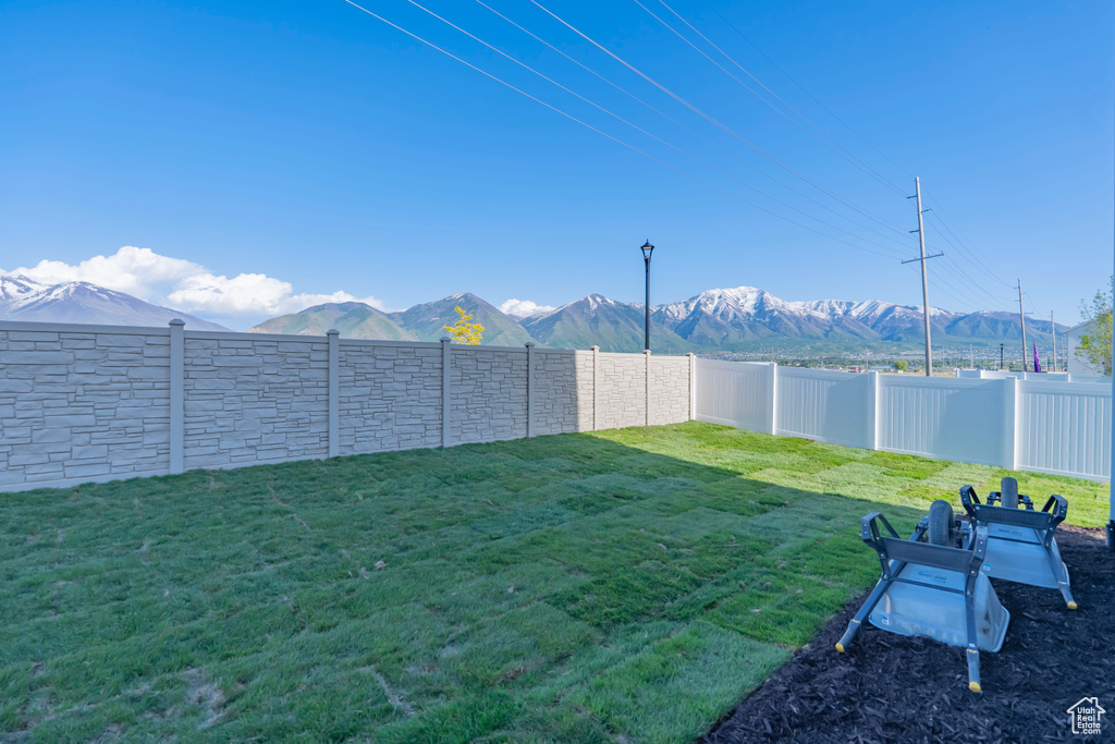 View of yard featuring a mountain view