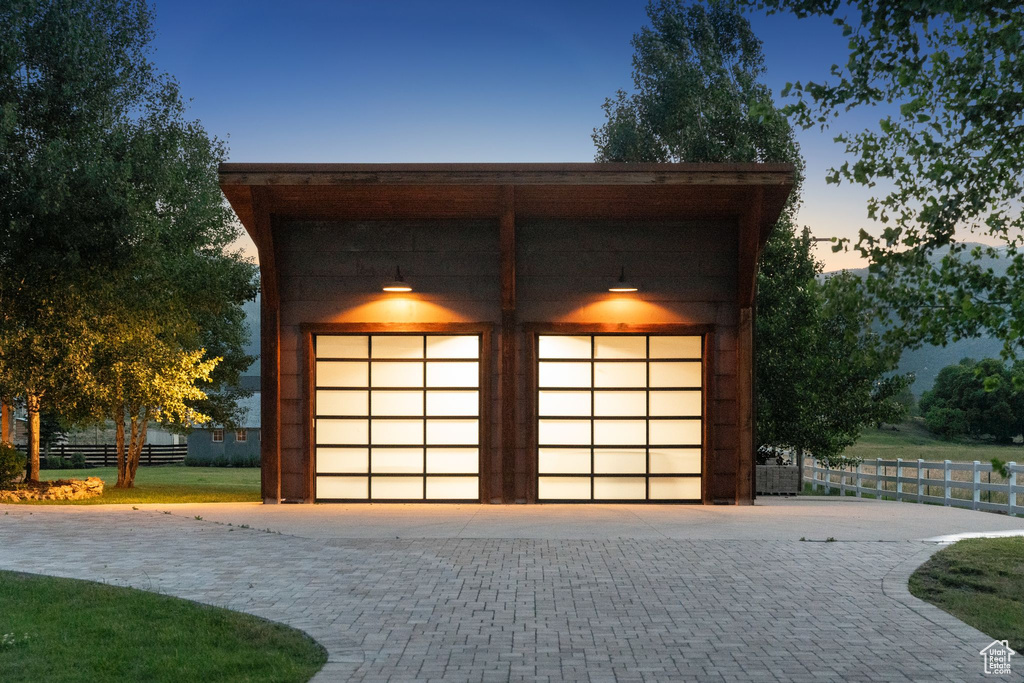 Garage at dusk with a garage
