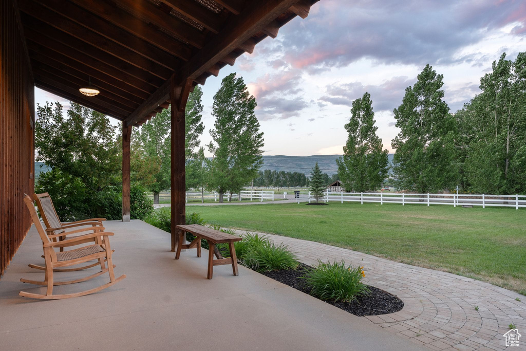 View of patio / terrace with a mountain view